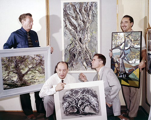 Joshua Meador, Marc Davis, Eyvind Earle, and Walt Peregoy display their paintings for the “4 Artists Paint 1 Tree” segment of the “An Adventure in Art” episode of the “Disneyland” television series (1958); courtesy of the Walt Disney Archives Photo Librar